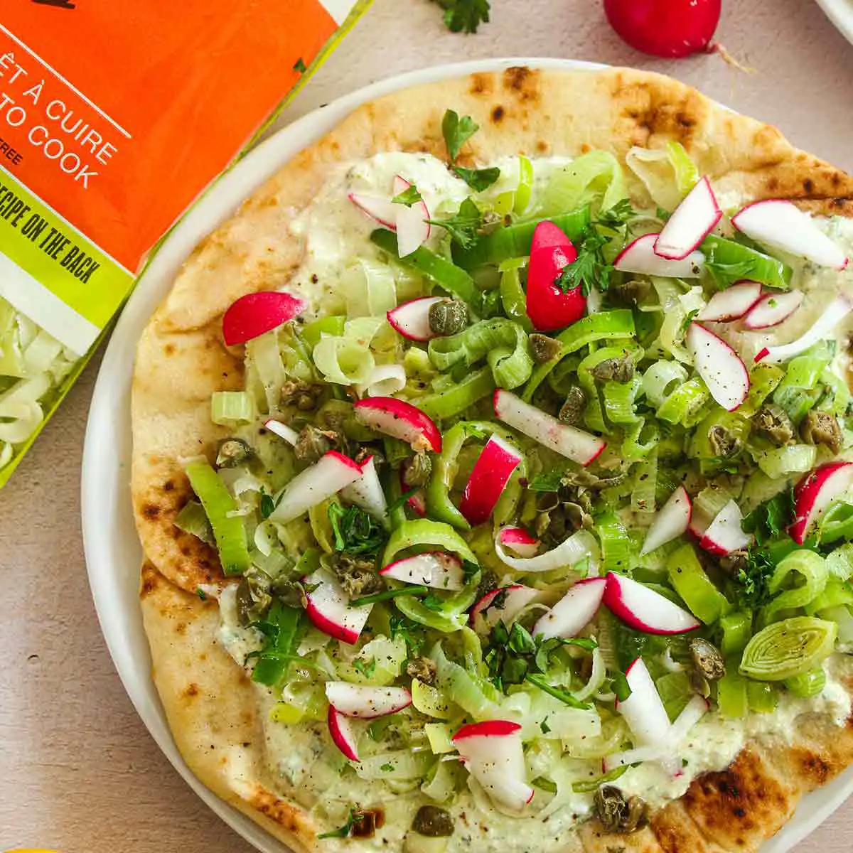 Flatbread with leeks, ricotta, fresh herbs and lemon