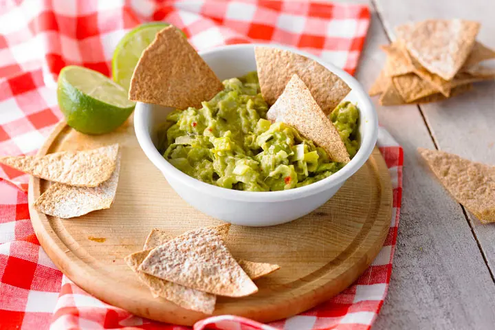 Homemade Tostitos recipe with tortilla chips and leek guacamole