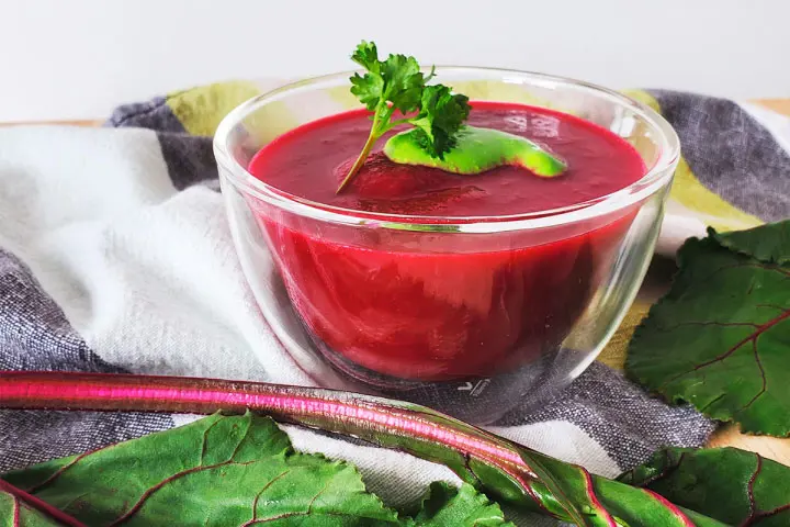 Beet and leek soup served in individual bowls