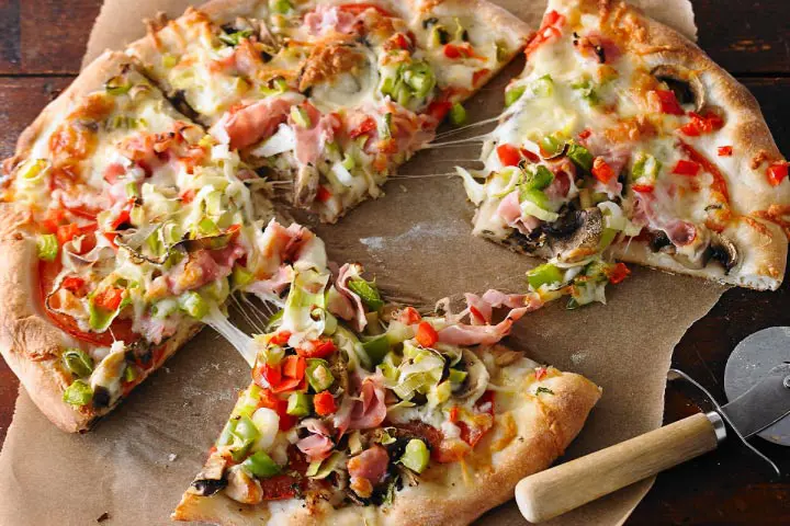 Homemade pizza with ham and leeks for the Super Bowl