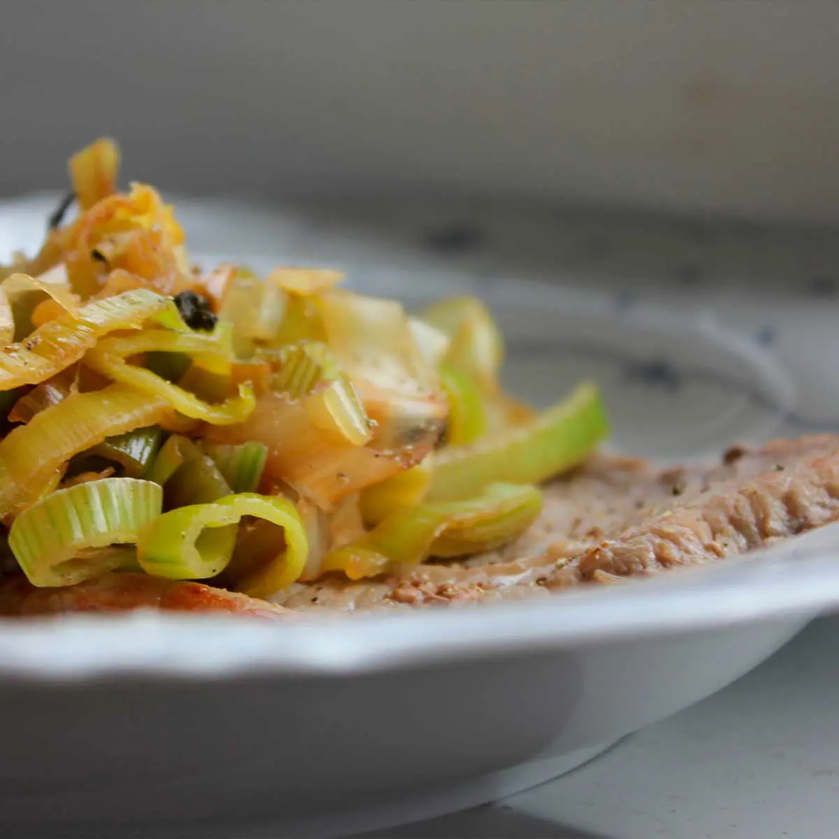 Gluten free veal cutlets, with leeks compote and celery root puree